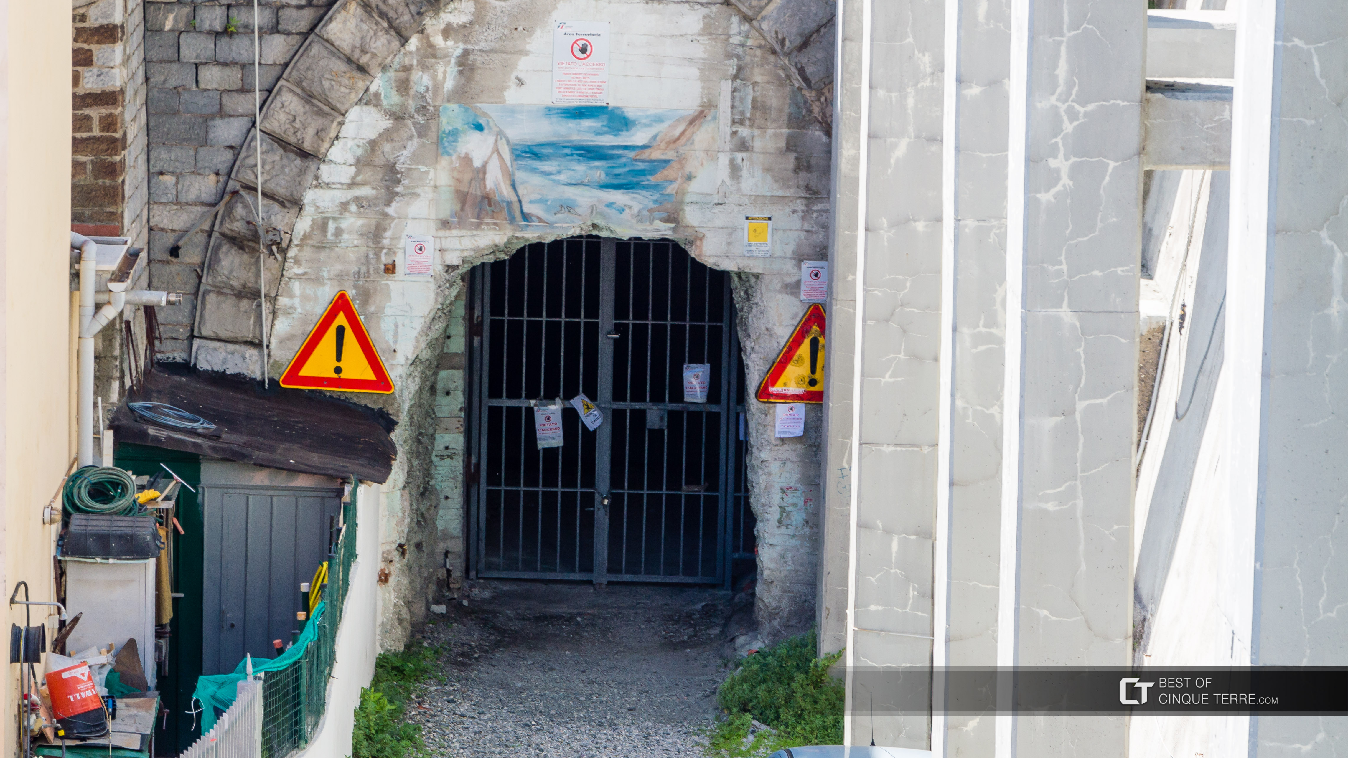 Dark tunnel to the nudist beach of Guvano is closed, Cinque Terre, Italy