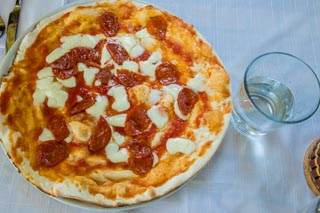 Pizza with spicy salami, Local food, Cinque Terre, Italy