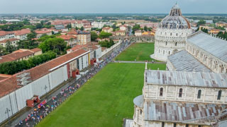 Piazza dei Miracoli seen from the Leaning Tower in the rain, Pisa, Italy